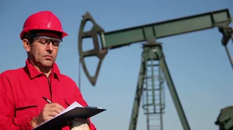 Oil Worker and Clipboard Stock Footage 12467254