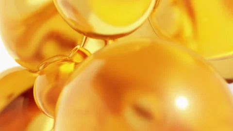 Oil yellow orange abstract background with round golden spheres close up Stock Footage 156199853