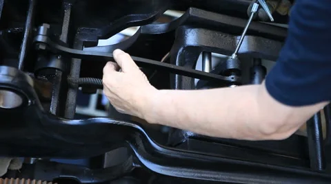 Oiling and making adjustments to letterpress Stock Footage 61606970