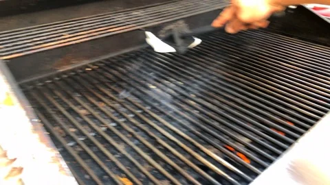 Oiling The Barbecue Grill Video stock 102011494