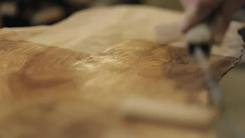 Oiling a Block of Natural Wood Stock Footage 70304499
