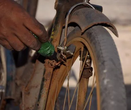 Oiling the brakes of cycle 스톡 사진