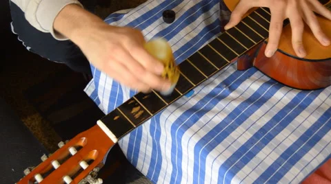 Oiling Guitar Neck Wiht Lemon Oil Stock Footage 68367854