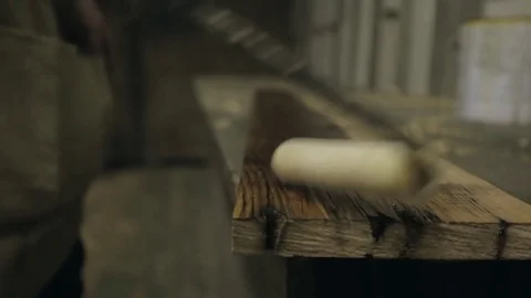 Oiling a Length of Timber Stock Footage 70304191