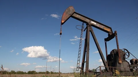 Oilwell Pump Jack in a Field Close Stock Footage 89237794