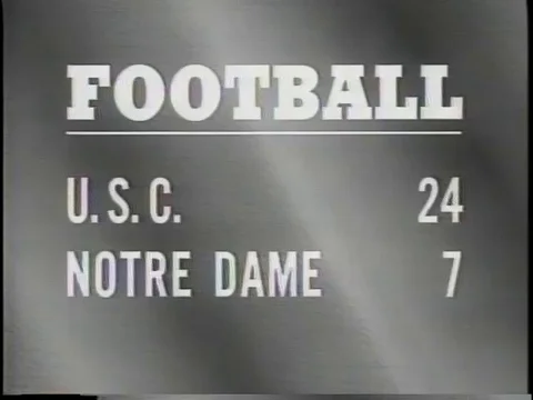 O.J. Simpson plays for U.S.C. vs Notre Dame college football 1967 Stock Footage 83831623