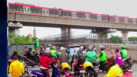 Ojol transports passengers 2 Stock Footage 329902796