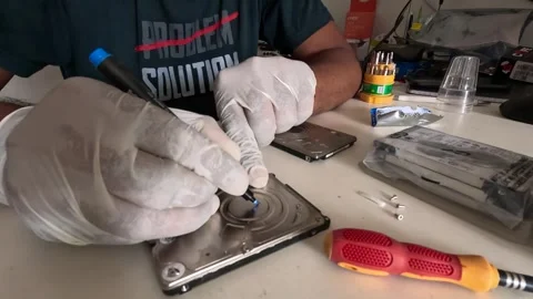 OK is being written to the restored harddisk by the technician Stock Footage 247818135