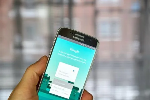 OK google on smartphone Stock Photos