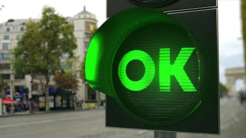 OK text on green traffic light signal. Conceptual 3D rendering Ilustração Stock