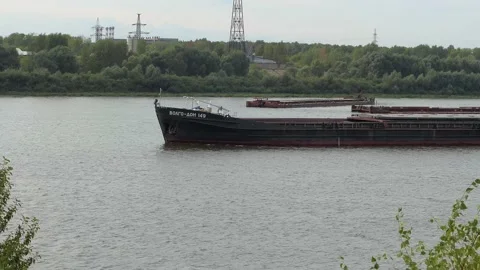 Oka River. A large barge goes along the river in summer. High quality 4k footage Stock Footage 159528092