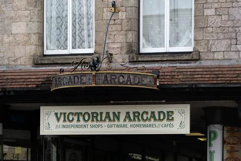 OKEHAMPTON, DEVON - JULY 30, 2026:  Sign outside the Victorian Arcade in We.. Stock Photos