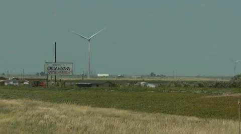 Oklahoma border sign and wind turbine Stock Footage 40447090