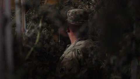 Oklahoma guardsmen inspecting marijuana plants at illegal growing facility Video stock 220478912