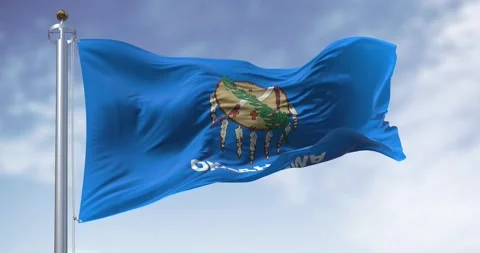 The Oklahoma state flag waving on a clear day Stock-Footage 293573717