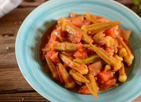 Okra dish with tomatoes Stock Photos