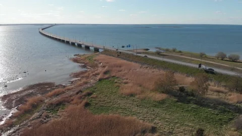 Oland Bridge with Sunset, Summer Day, Sweden, Aerial Pull Back Dolly Stock-Footage 210449486