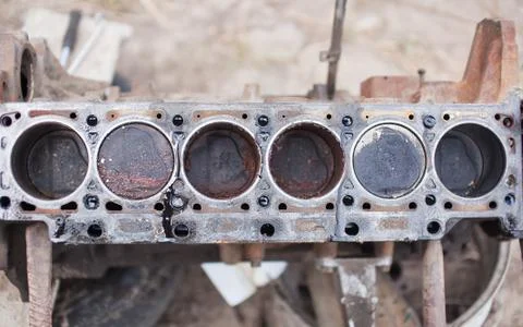 Old 6-cylinder engine with rusty pistons Stock Photos