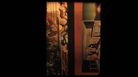 Old 8mm film strip as illustration for art history lesson slip from projector Stock Footage 59140315