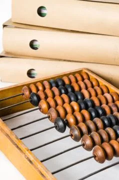 Old abacus and folders with documents, close-up isolated on whit Stock Photos