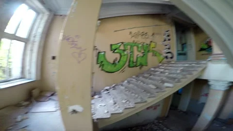 Old abandoned building, stairs without railings, graffiti on the walls, empty Stock Footage 160908238
