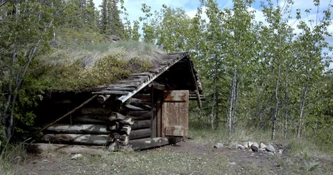 Old abandoned cabin in the Yukon - Static tripod shot Stock Footage 94659242