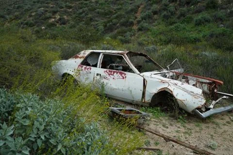 Old abandoned car without the engine Stock Photos