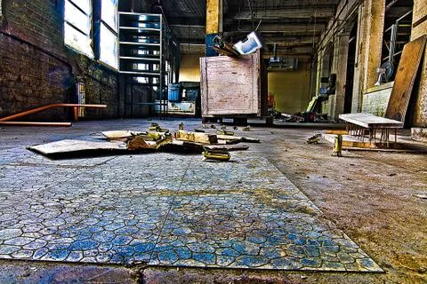An old abandoned empty warehouse. Stock Photos