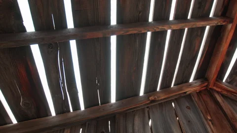 Old Abandoned Ghost Town in America with Sunlight Through Wooden Roof Slats. Stock Footage 339509885
