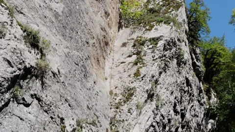 An old abandoned highway in the mountains. Rocks, mountain gorge. Stock Footage 221298098