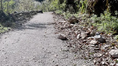 An old abandoned highway in the mountains. Rocks, mountain gorge. Stock Footage 221298287