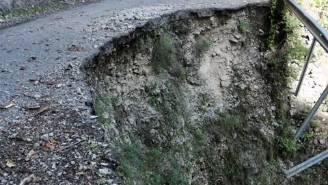 An old abandoned highway in the mountains. Rocks, mountain gorge. Stock Footage 221298690