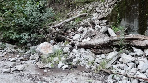 An old abandoned highway in the mountains. Rocks, mountain gorge. Stock Footage 221298691