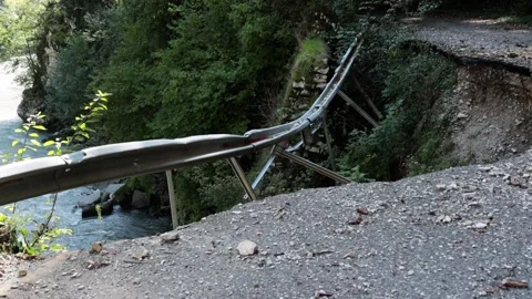 An old abandoned highway in the mountains. Rocks, mountain gorge. Stock Footage 221298693