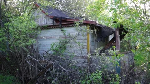An old abandoned house Devastation Broken Windows Decline Stock Footage 132169008
