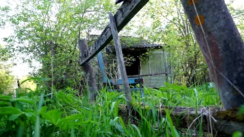 An old abandoned house Devastation Broken Windows Decline Stock Footage 132169175