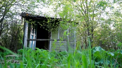 An old abandoned house Devastation Broken Windows Decline Stock Footage 132169245