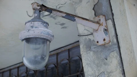 Old abandoned lantern, flaky, peeling paint. Apocalypse Stock Footage 103859132