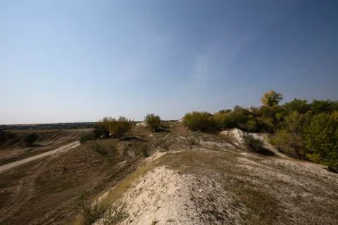 Old abandoned limestone quarry. Stock Photos