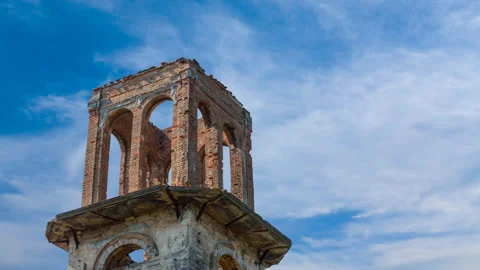 Old abandoned medieval castle tower on blue sky background Stock Footage 323366482