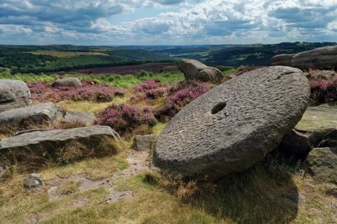 Old abandoned millstone Stock Photos