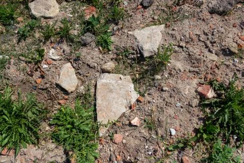Old abandoned or dilapidated construction objects of brick and concrete on the o Stock Photos