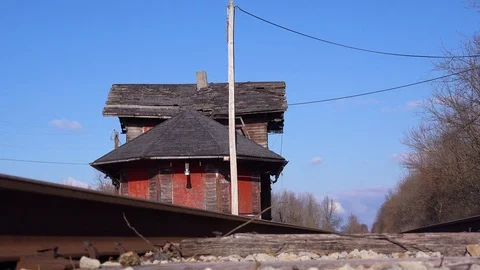 An old abandoned railways station platform and empty rail line railroad track in Stock Footage 113283866