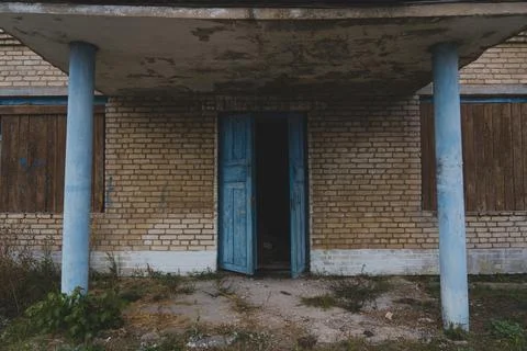 An old, abandoned, rustic store. The main entrance to the abandoned store Stock Photos