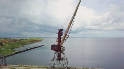 An old abandoned rusty crane in the seaport. Video stock 157106108
