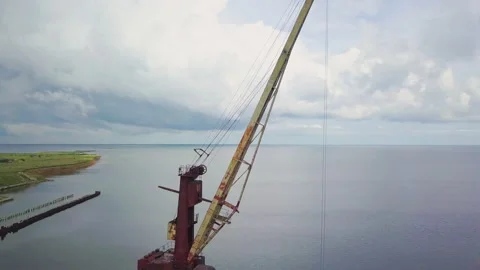 An old abandoned rusty crane in the seaport. Video stock 157107500