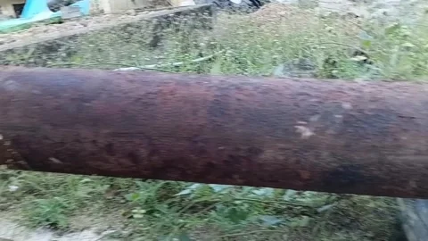 Old Abandoned Rusty Ductile Iron Water Pipe on Ground 스톡 동영상 333961503