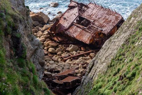 An old abandoned shipwreck on the coast of Cornwall Stock Photos