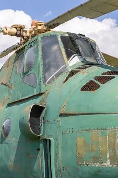 Old abandoned Soviet made helicopter wreckage. Stock Photos