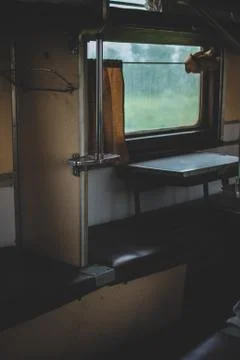 Old abandoned soviet train car. Places for passangers Stock Photos